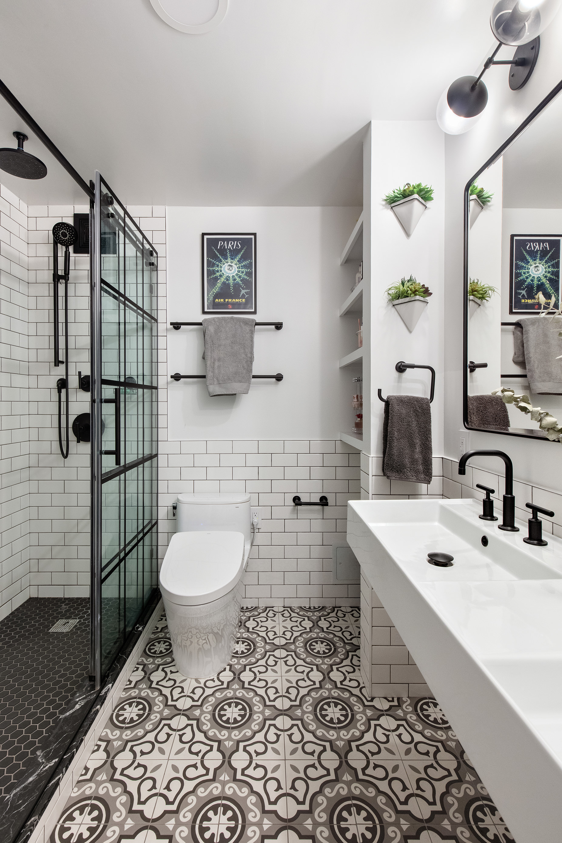 372 5th Avenue, Unit 5L Manhattan, NY 10018 - Photo 5 of 6 a bathroom with a sink toilet and shower