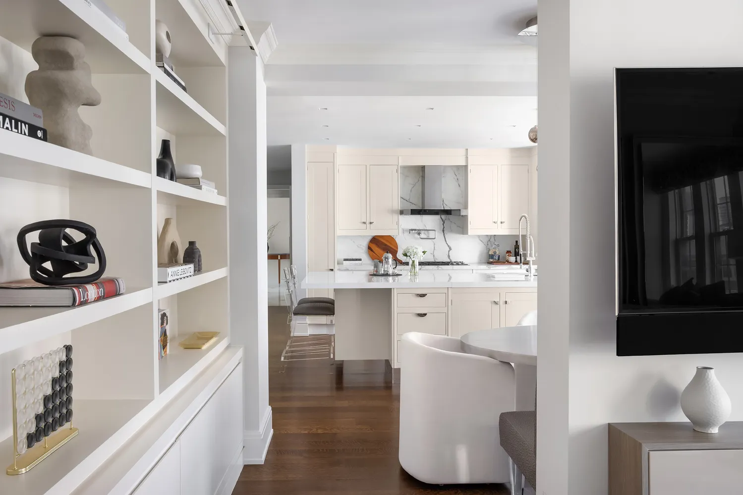 a kitchen with a white cabinets and white appliances