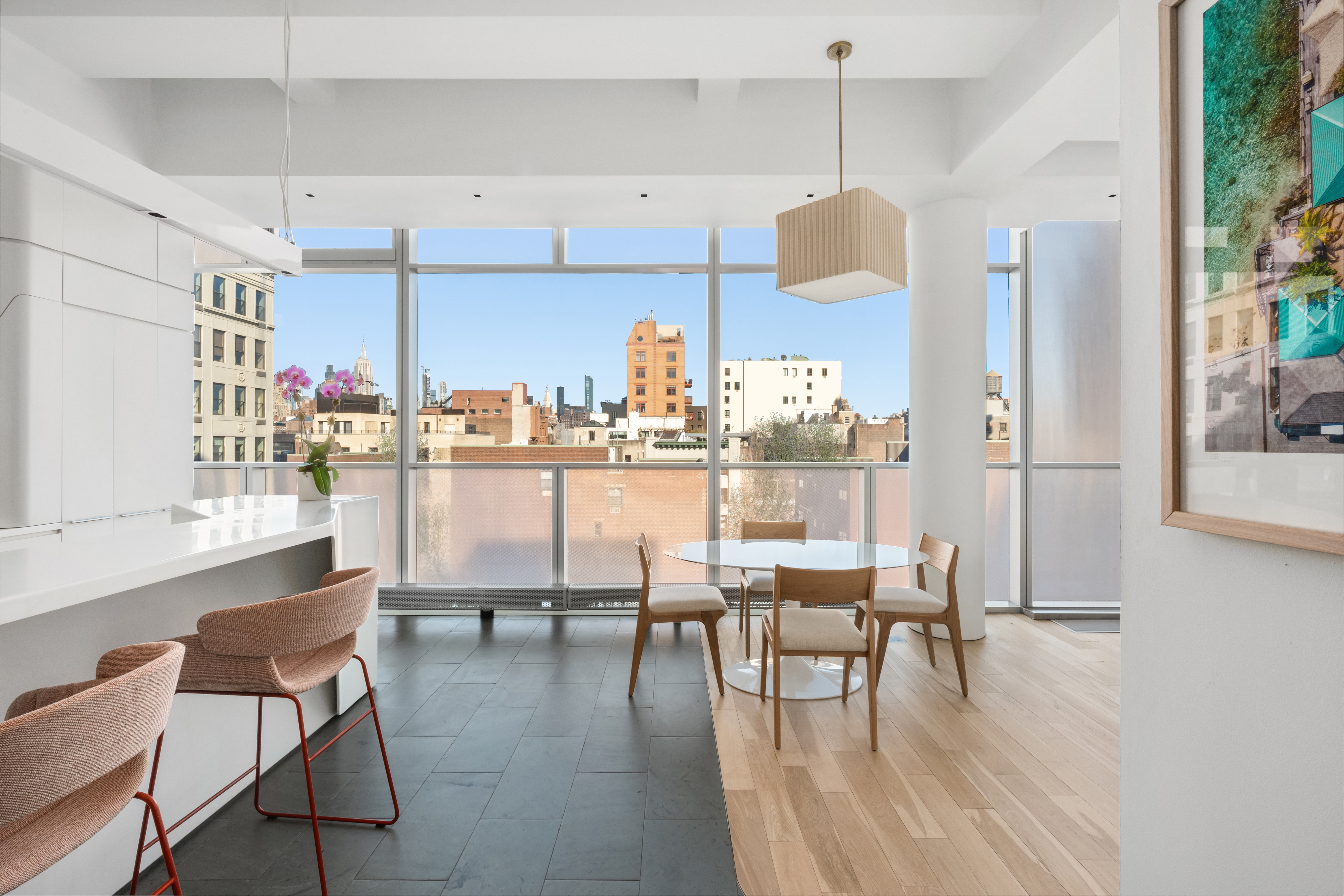 166 Perry Street, Unit 6B Manhattan, NY 10014 - Photo 7 of 17 a dining room with furniture and wooden floor