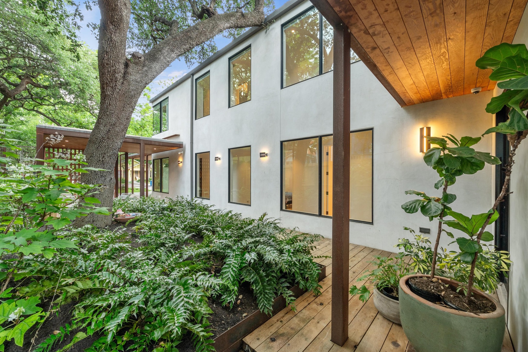 1206 Bickler Road Austin, TX 78704 - Photo 18 of 65 a front view of a house with garden
