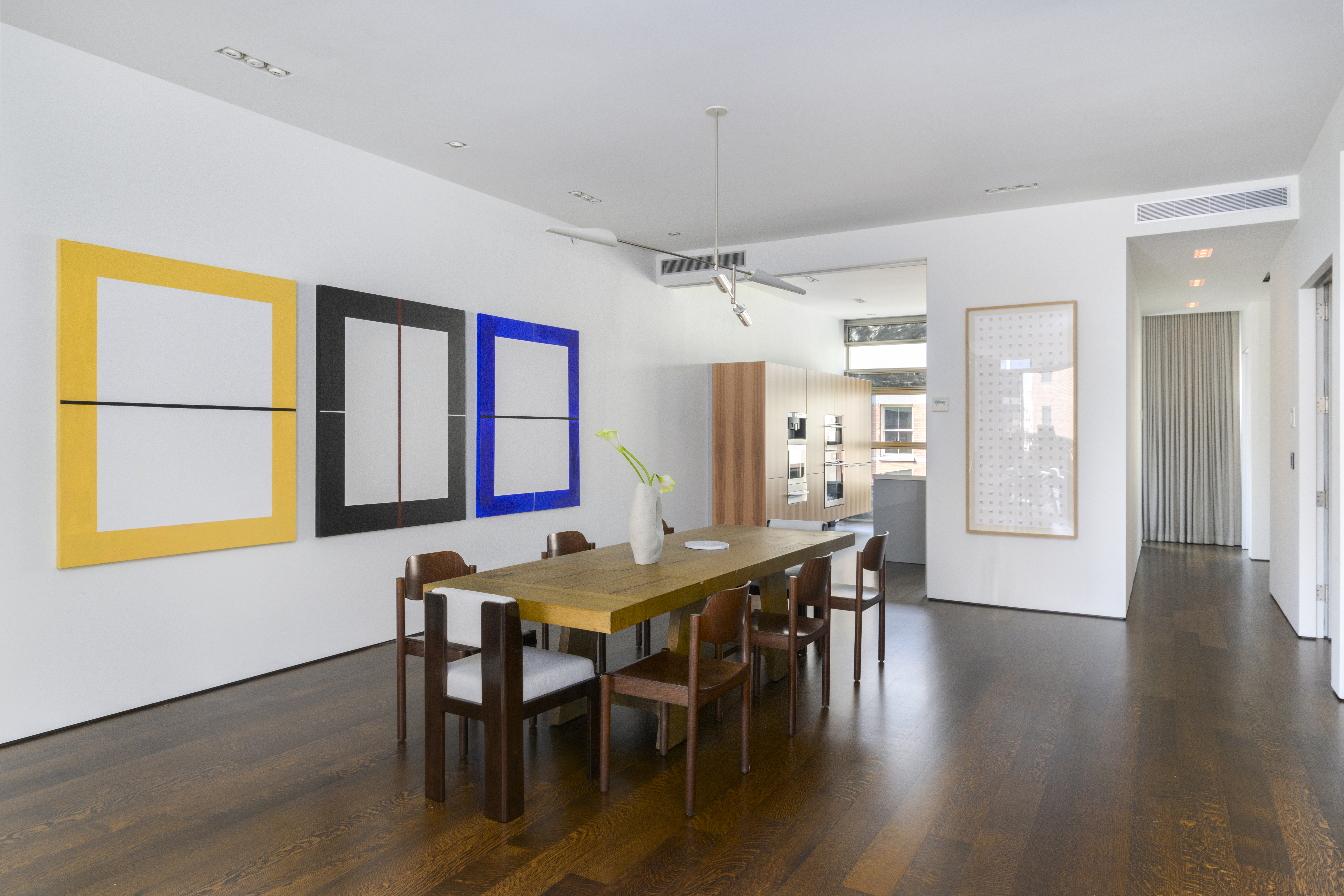 33 Vestry Street Manhattan, NY 10013 - Photo 13 of 16 a view of a dining room with furniture and wooden floor