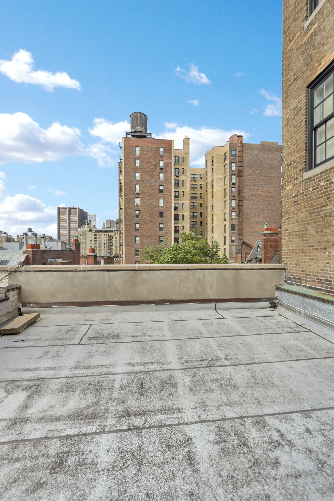 72 East 93rd Street, Unit 5AB Manhattan, NY 10128 - Photo 15 of 17 a view of city with tall buildings