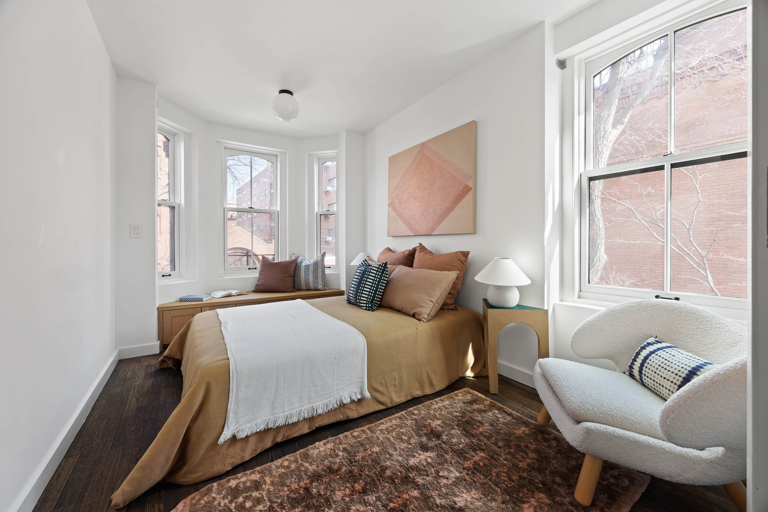 148 Warren Street Brooklyn, NY 11201 - Photo 11 of 20 a bedroom with a bed and a couch