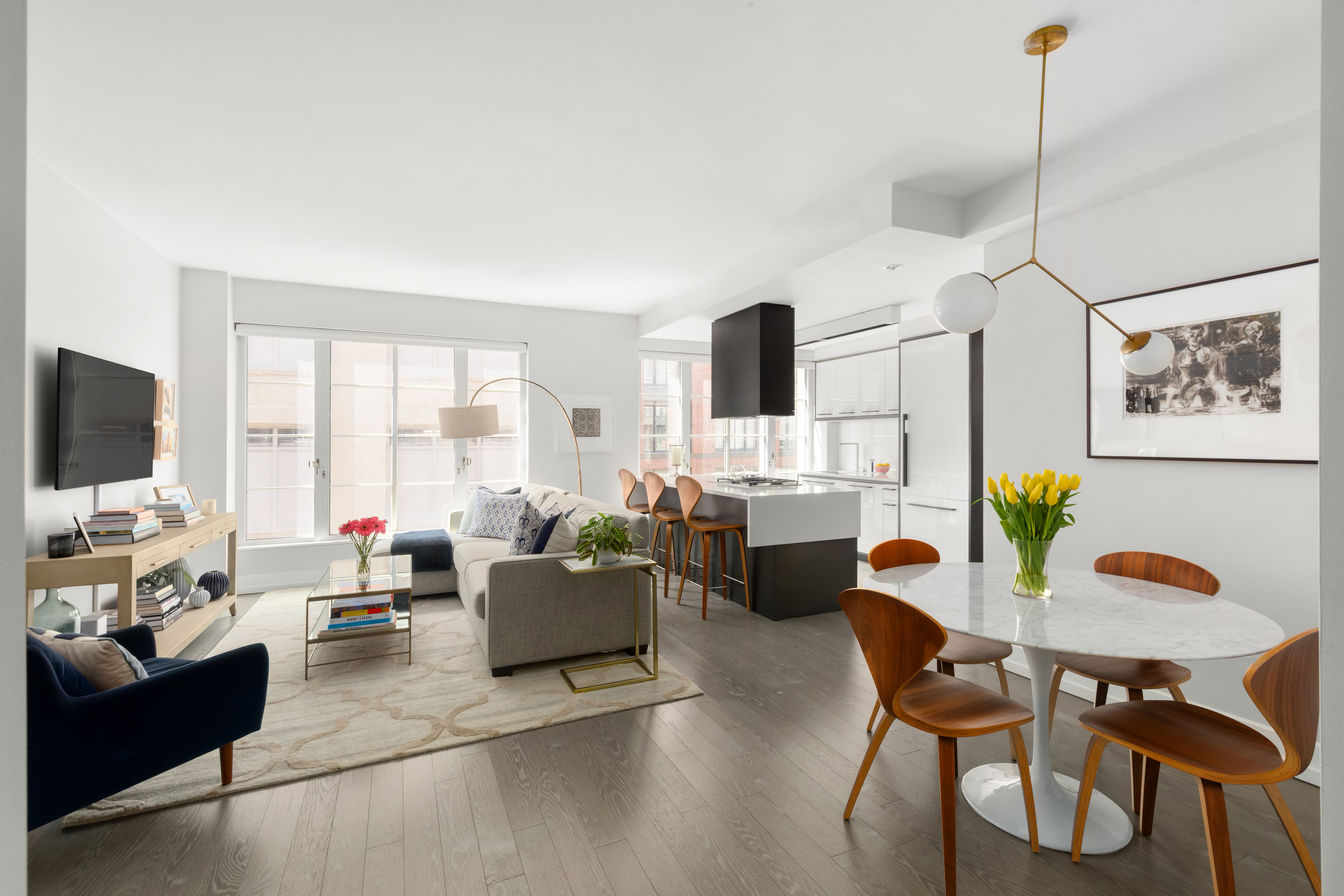 a living room with furniture and a flat screen tv