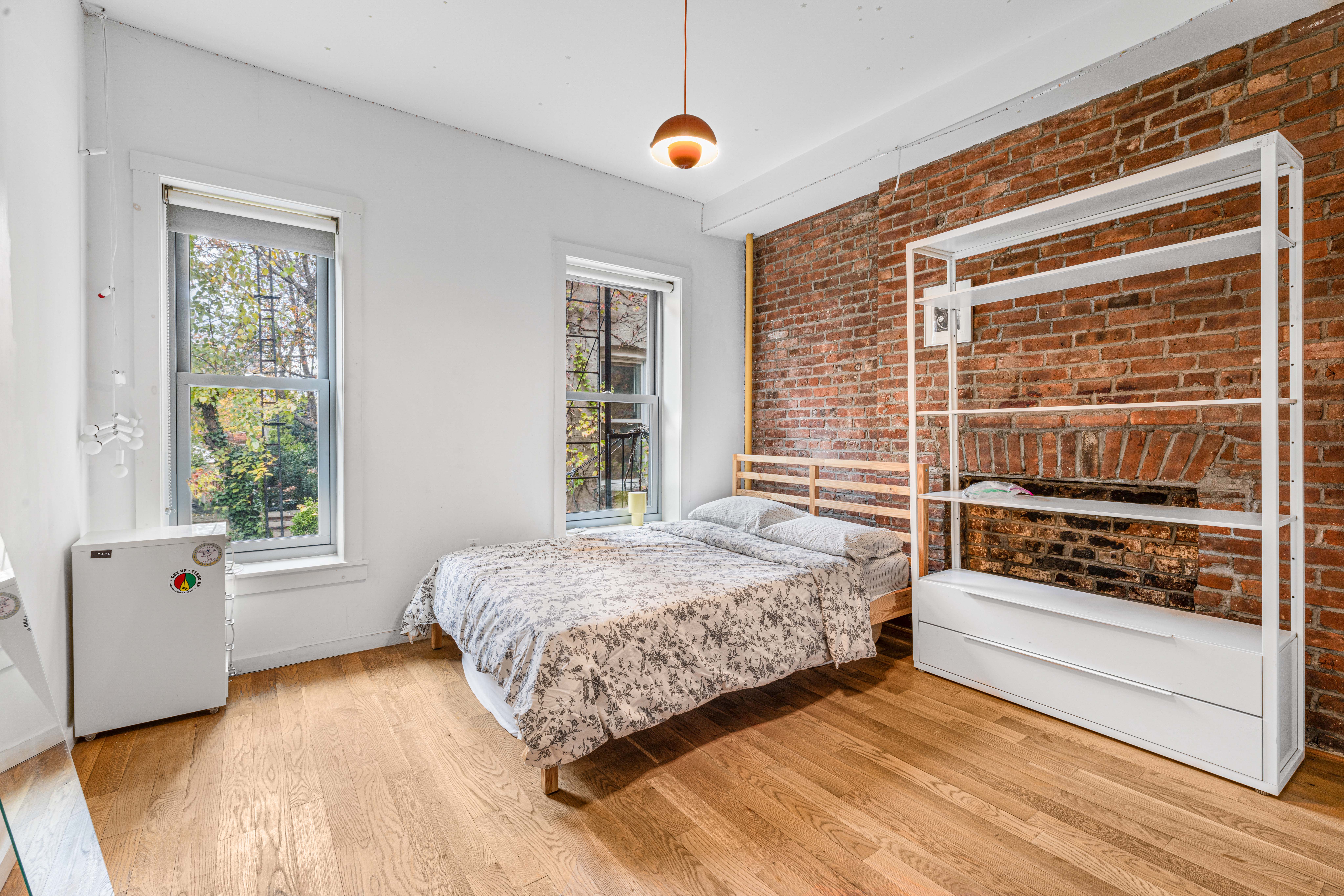 209 Calyer Street, Unit 2 Brooklyn, NY 11222 - Photo 7 of 17 a bedroom with a bed and a window