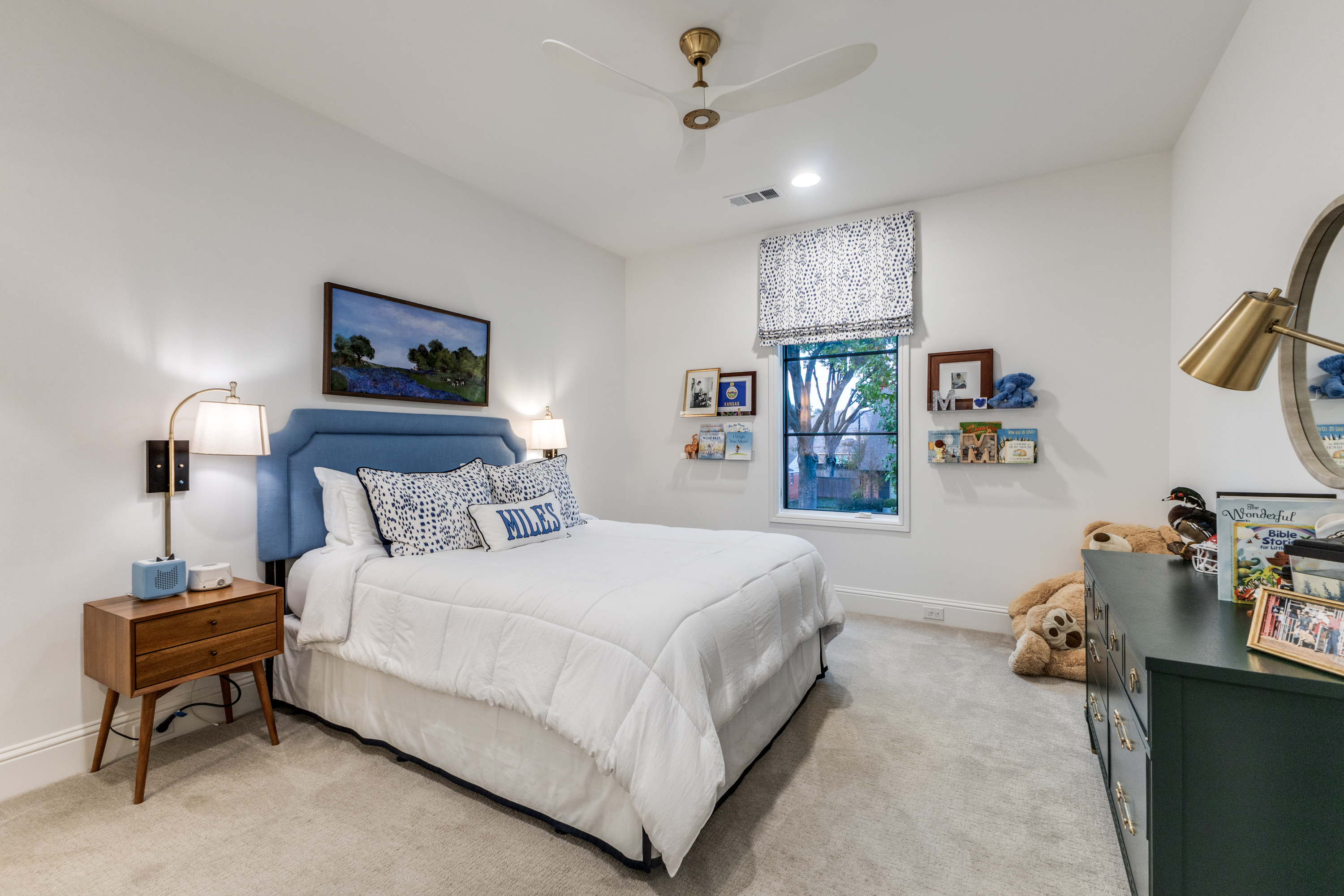 4042 Dunhaven Road Dallas, TX 75220 - Photo 24 of 34 a bedroom with a bed and a table