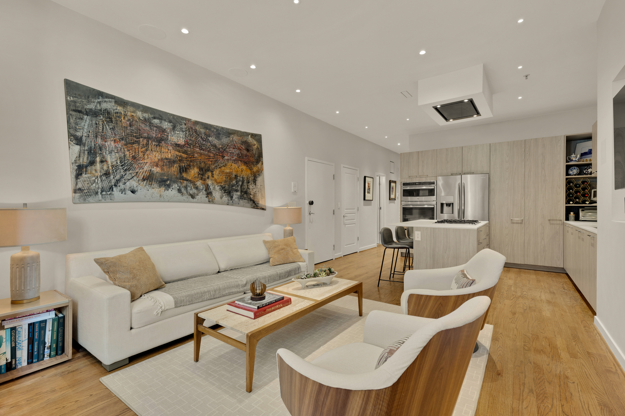 1407 15th Street Northwest, Unit 2 Washington, DC 20005 - Photo 7 of 24 a living room with furniture and kitchen view
