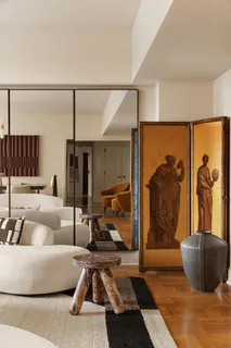 a living room with furniture and a couch