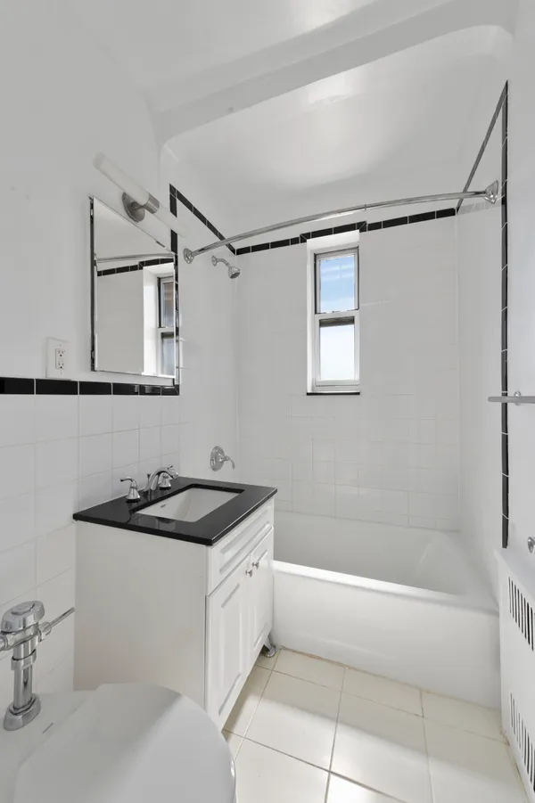 a bathroom with a sink and a bathtub