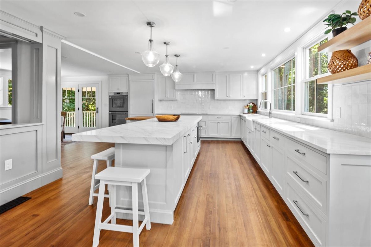 49 Garrison Road Hingham, MA 02043 - Photo 7 of 30 a large kitchen with granite countertop lots of counter space and window