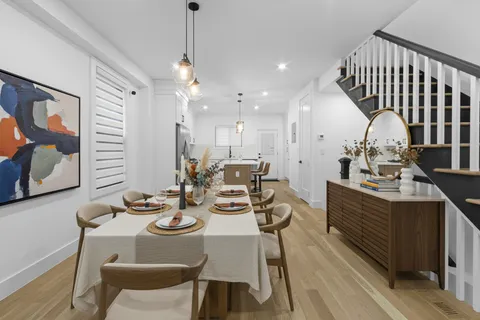 a view of a dining room with furniture