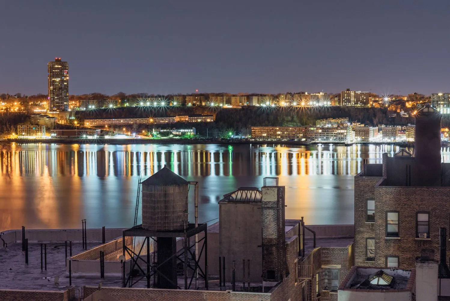 a view of a chairs and table in patio