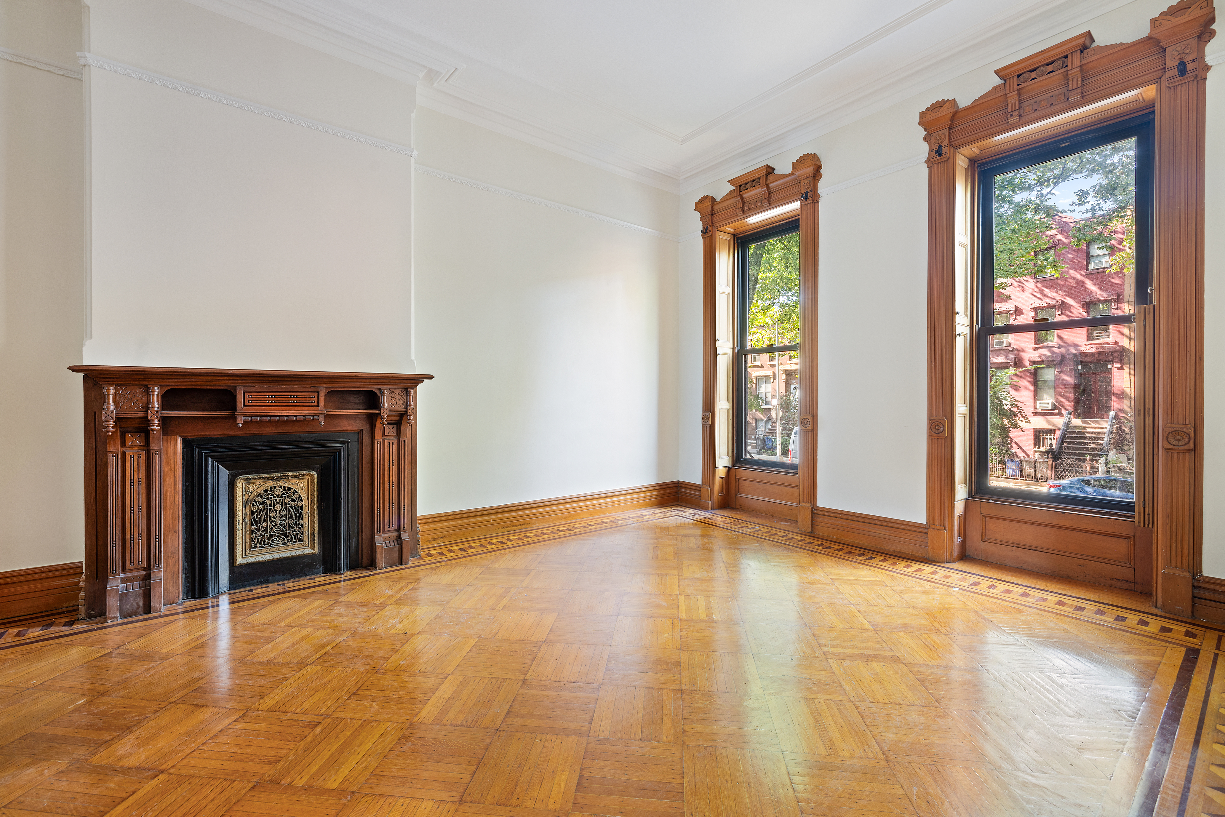 778 Quincy Street, Unit 2 Brooklyn, NY 11221 - Photo 2 of 14 a view of an empty room with window and fire place