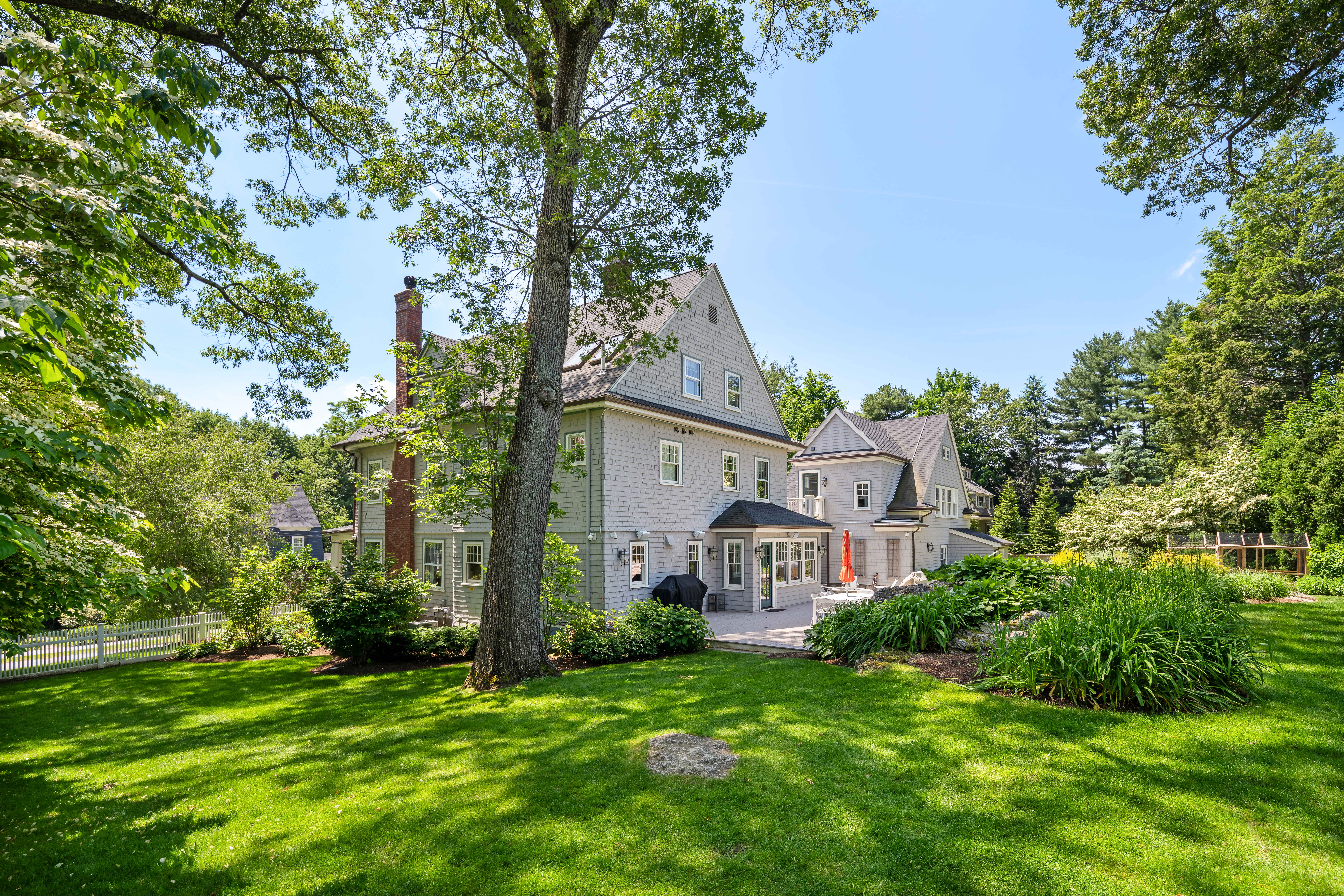 161 Pine Ridge Road Waban, MA 02468 - Photo 5 of 8 a front view of a house with a yard