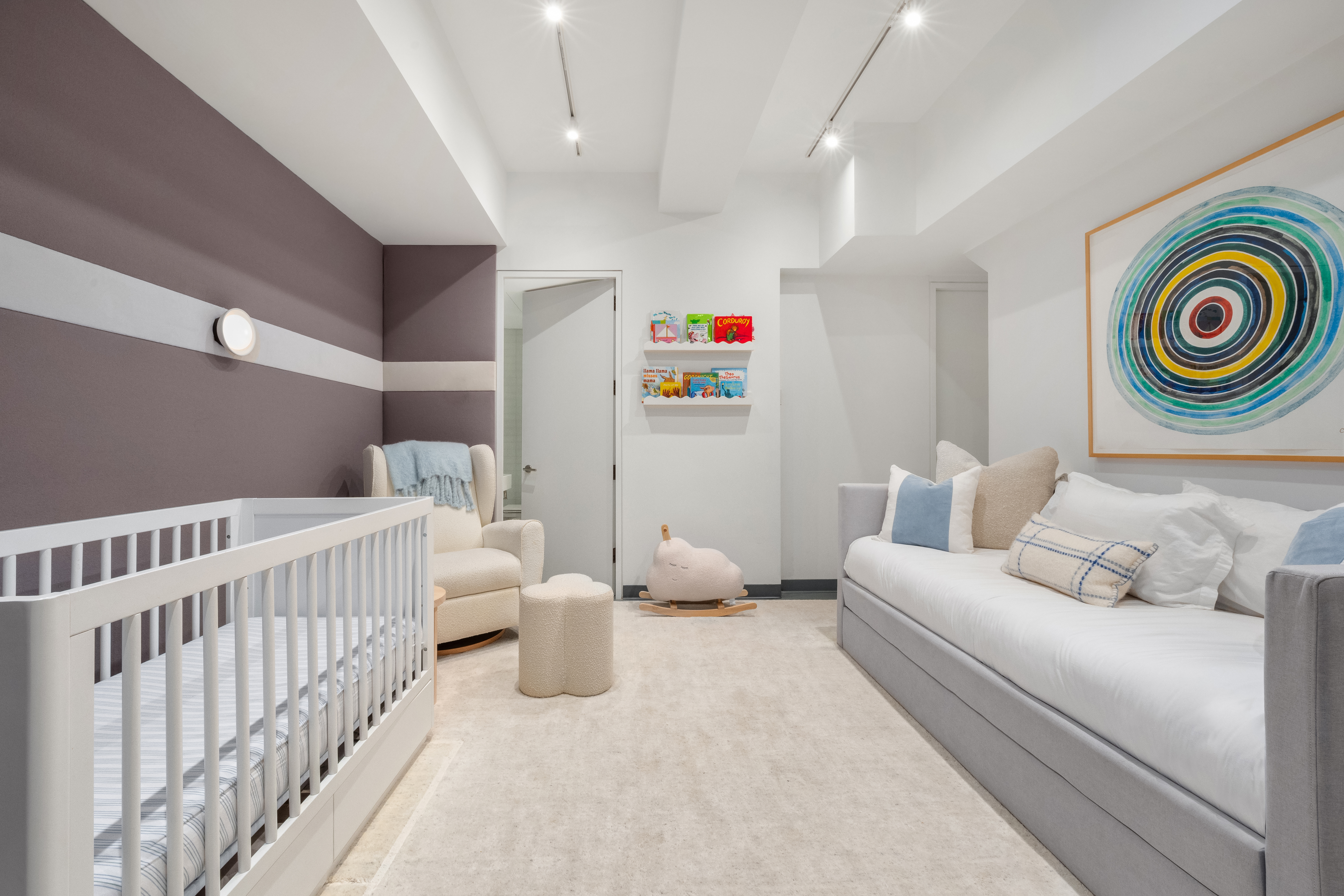 166 Perry Street, Unit 1B Manhattan, NY 10014 - Photo 9 of 17 a bedroom with furniture and a large window