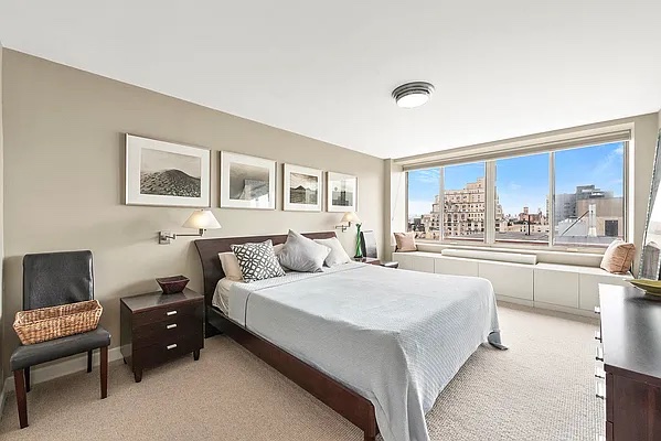 250 West 90th Street, Unit PH1E Manhattan, NY 10024 - Photo 3 of 13 a bedroom with a bed and a large window