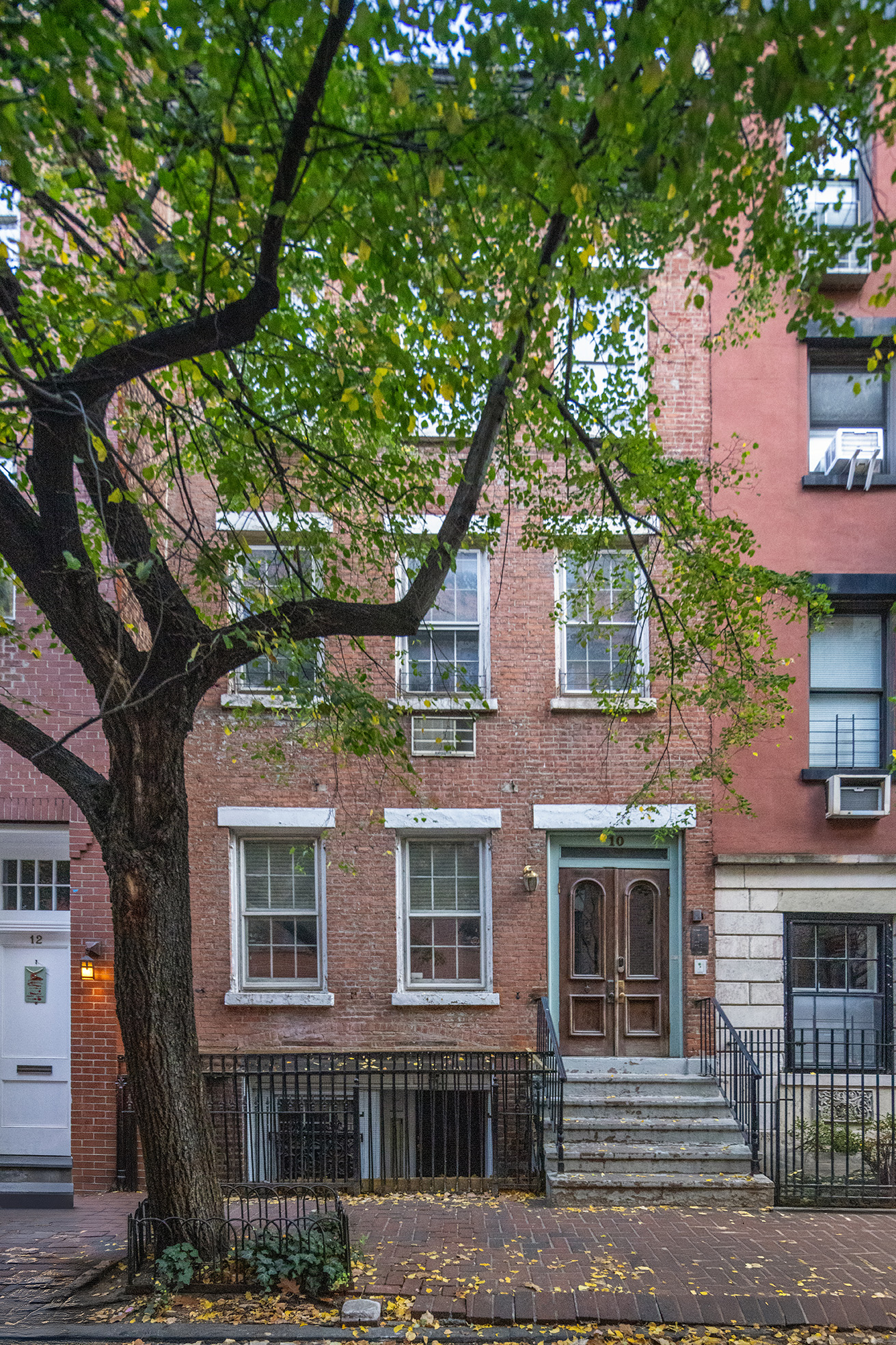 10 Bedford Street Manhattan, NY 10014 - Photo 2 of 29 a front view of a house with balcony