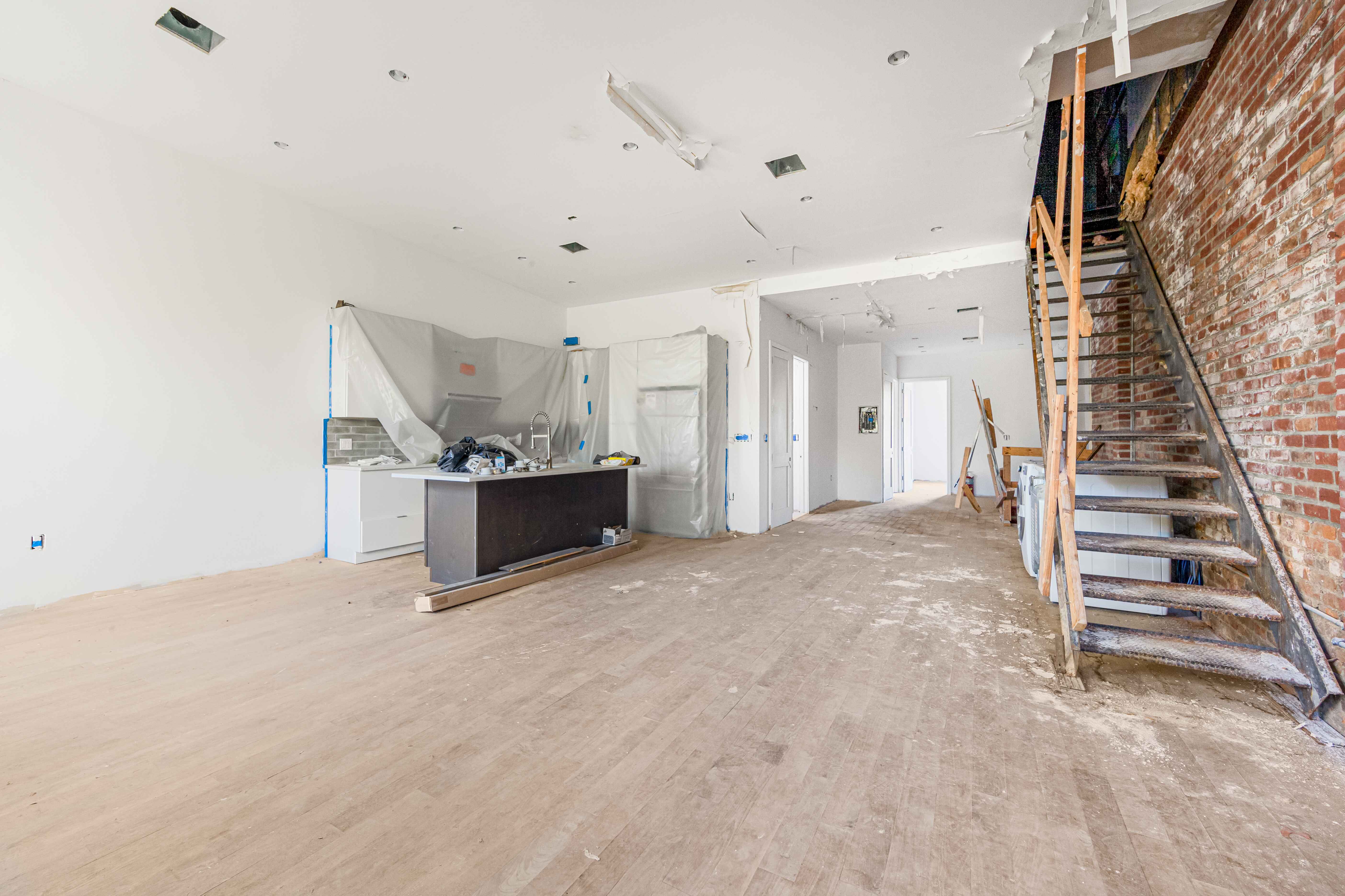 913 Lafayette Avenue Brooklyn, NY 11221 - Photo 13 of 19 a view of a kitchen with furniture and stairs