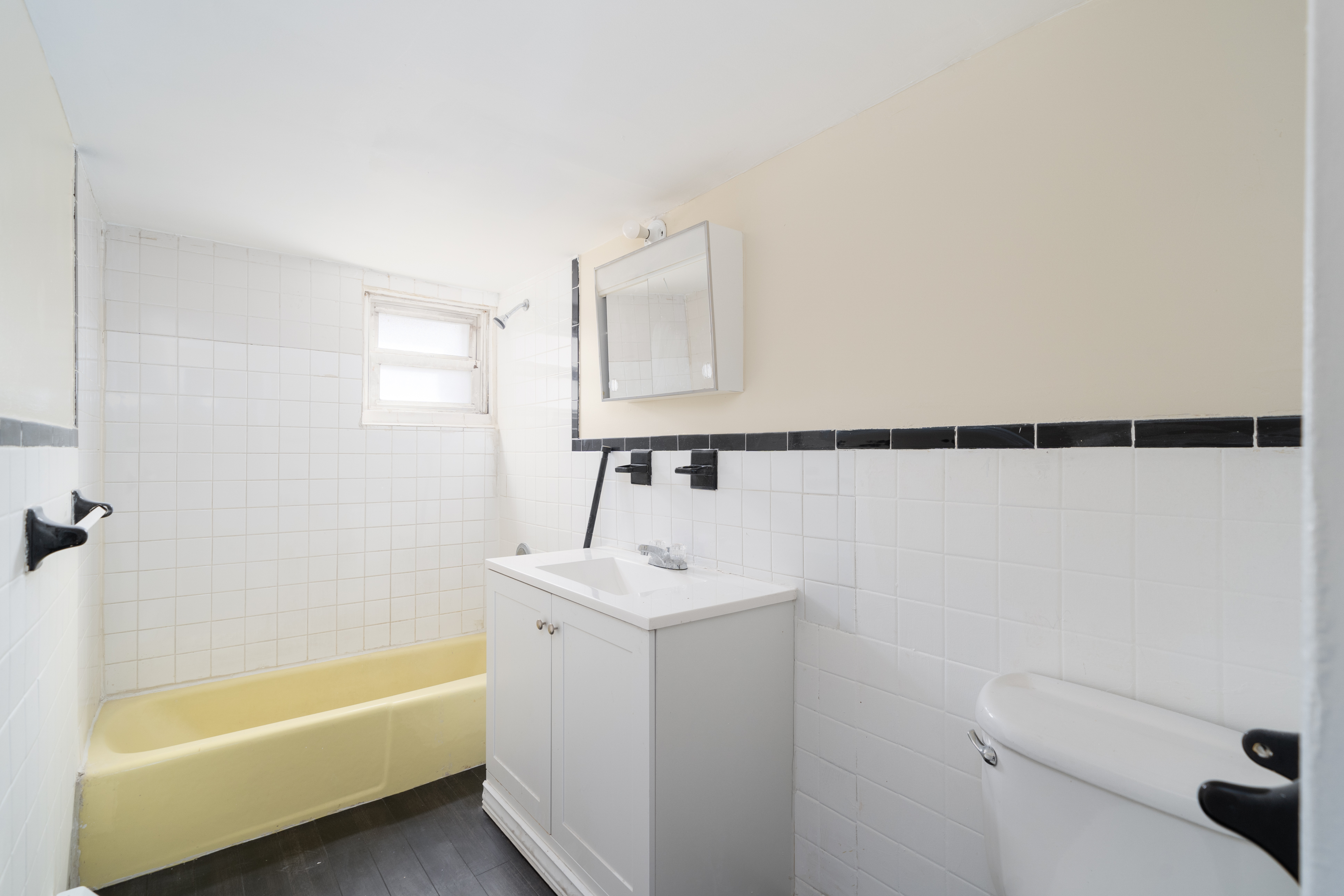 100-108 35th Street Union City, NJ 07087 - Photo 10 of 17 a bathroom with a sink a toilet and bathtub