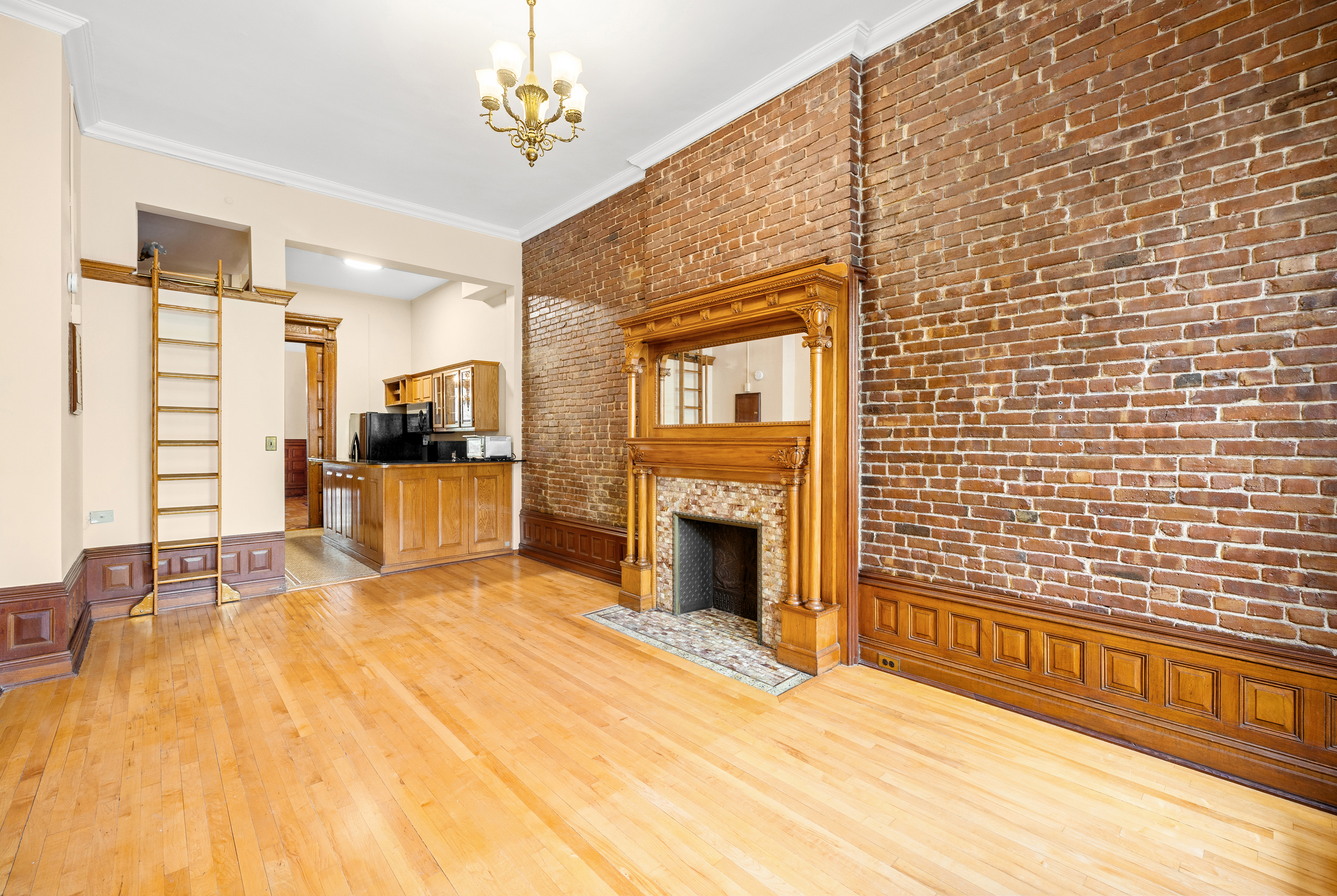 154 West 77th Street, Unit #1 Manhattan, NY 10024 - Photo 2 of 10 a view of a livingroom with a fireplace