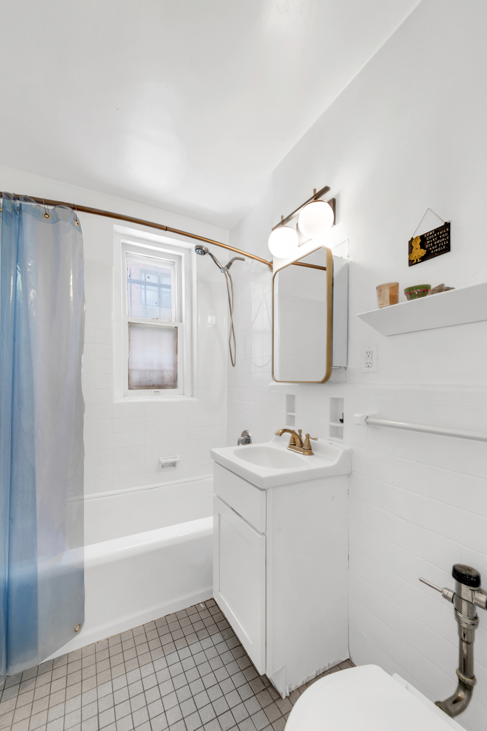 385 Argyle Road, Unit 1B Brooklyn, NY 11218 - Photo 9 of 11 a bathroom with a sink toilet and bathtub