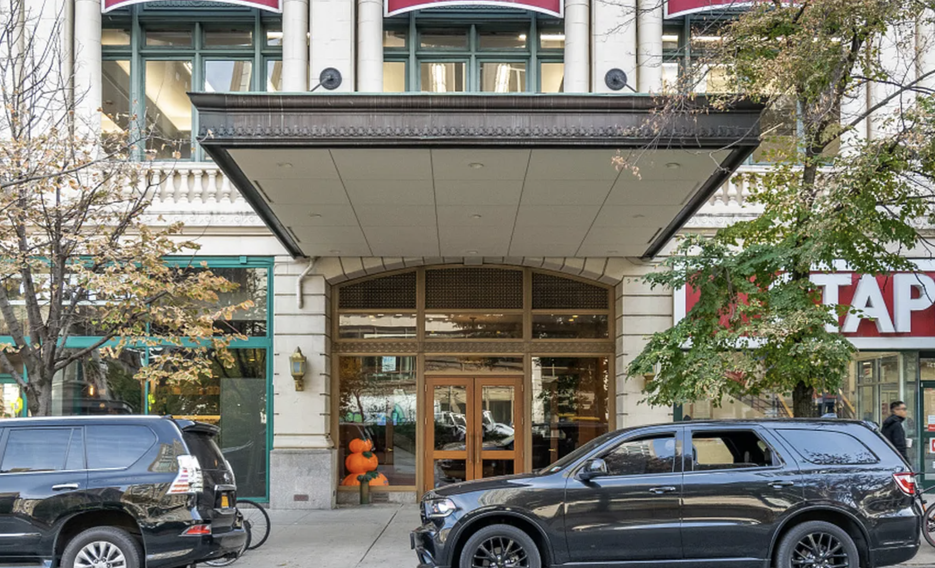2250 Broadway, Unit 6J Manhattan, NY 10024 - Photo 8 of 10 a view of cars parked in front of a building
