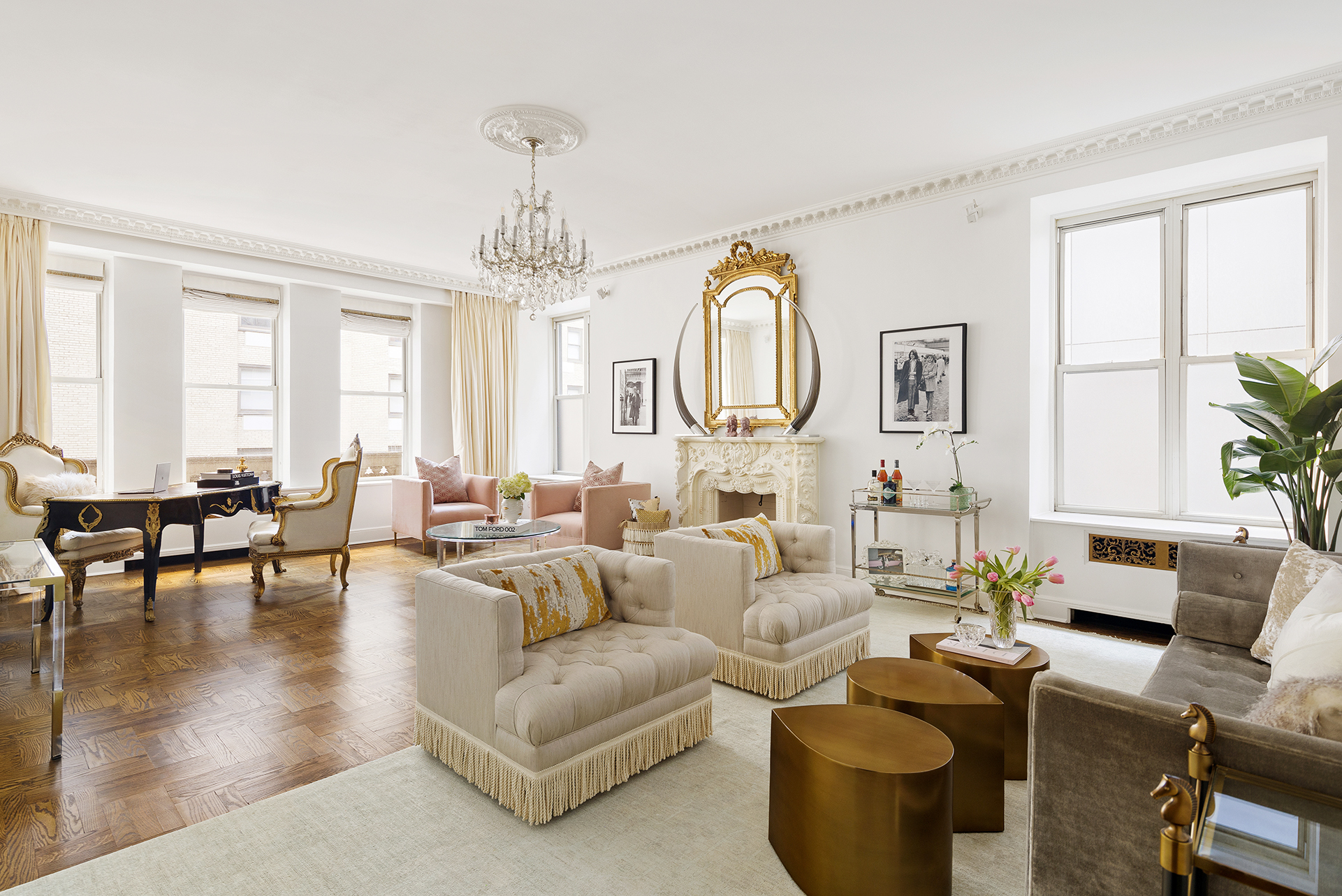180 West 58th Street, Unit 5A Manhattan, NY 10019 - Photo 1 of 17 a living room with furniture and a large window