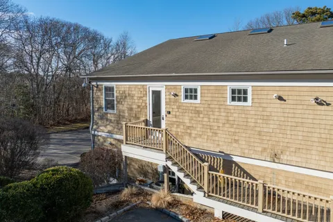 a view of a cars parked on the side of a road