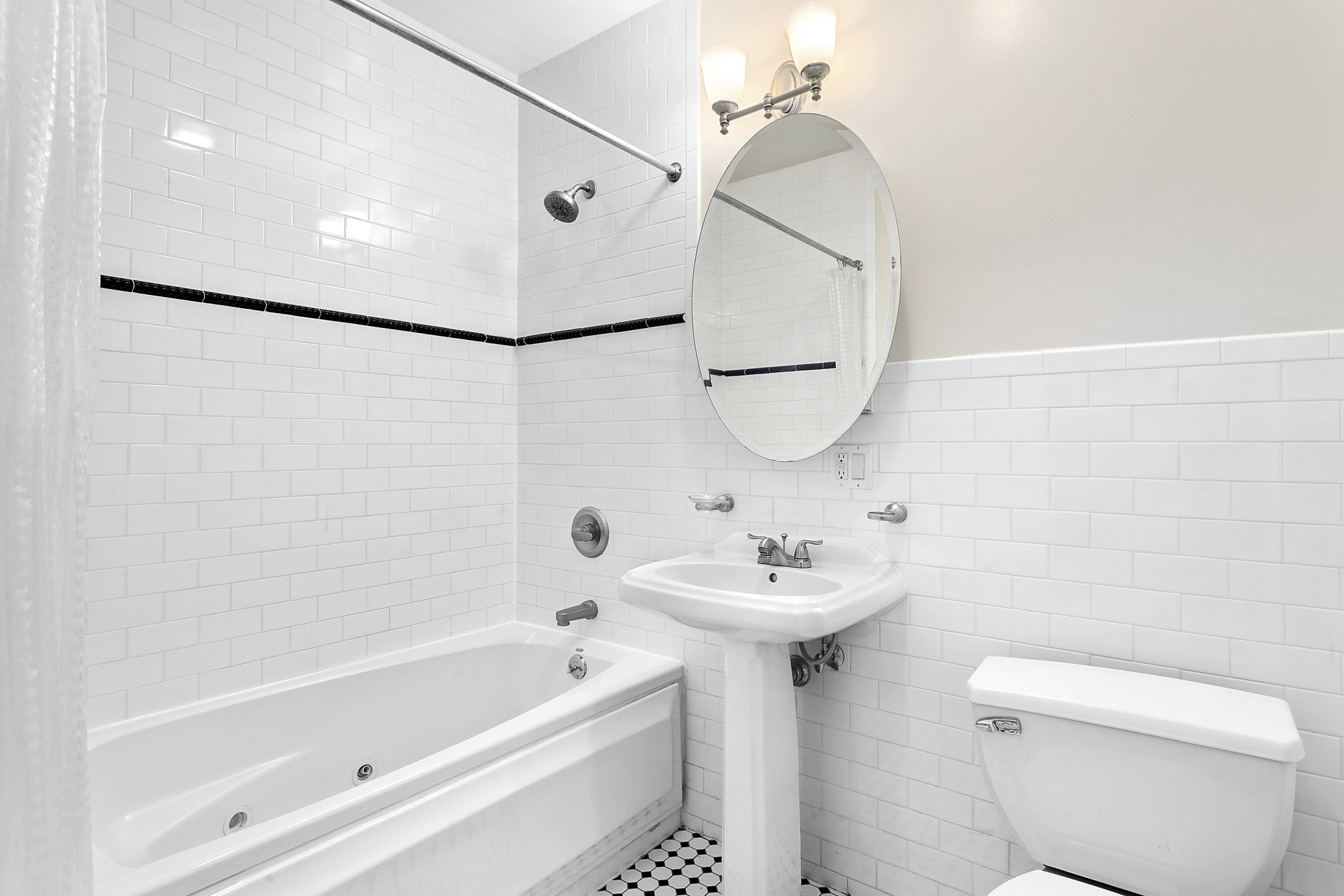 330 Bergen Street, Unit 4D Brooklyn, NY 11217 - Photo 8 of 9 a bathroom with a sink a toilet and shower