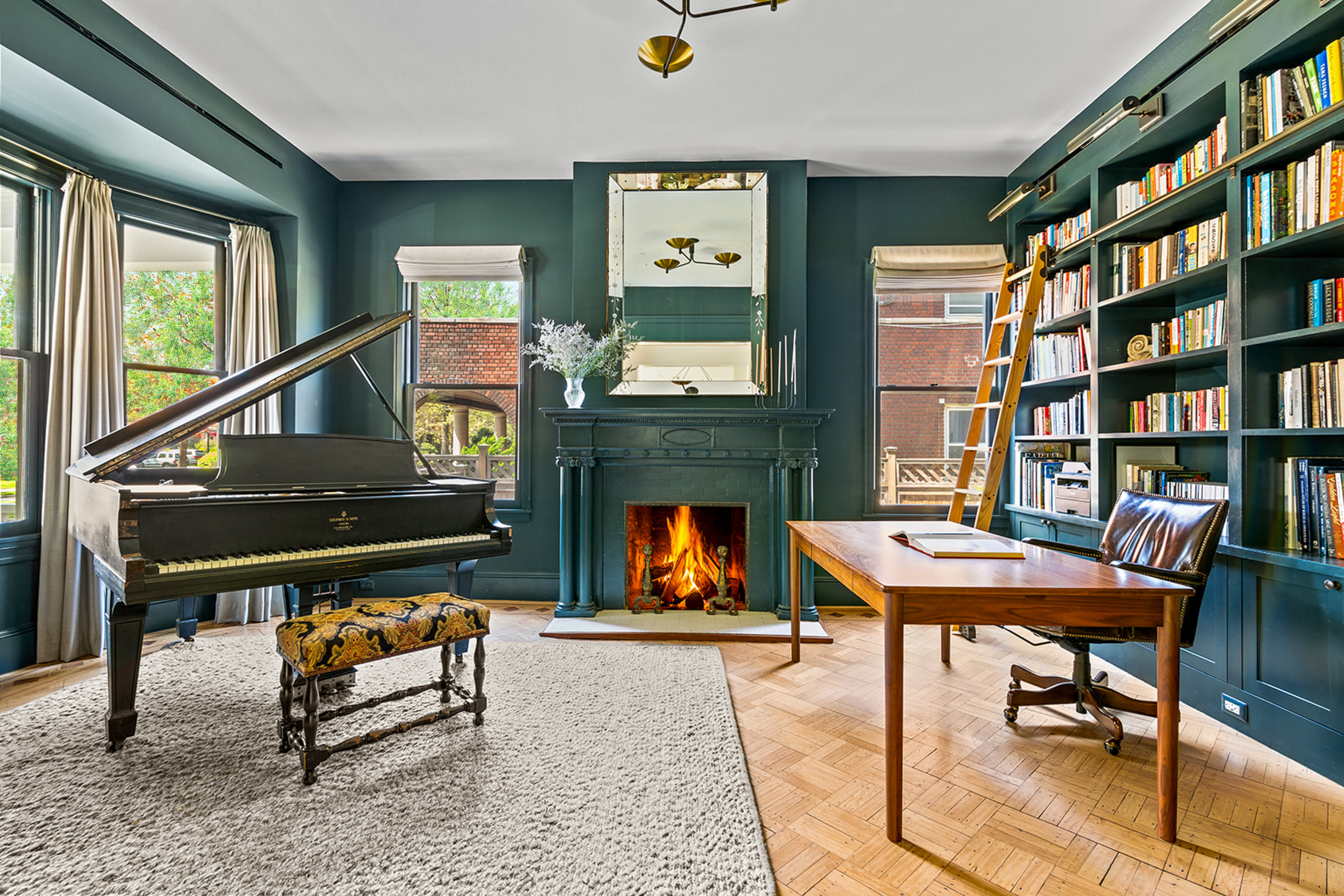 1221 Albemarle Road Brooklyn, NY 11218 - Photo 12 of 45 a living room with furniture a rug and a fireplace