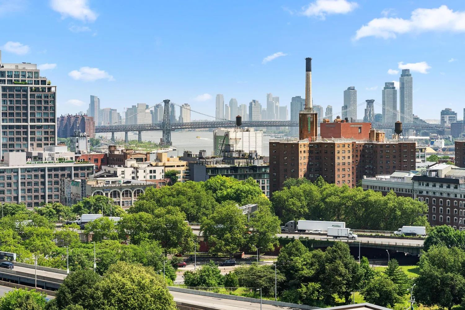 a view of a city with tall buildings