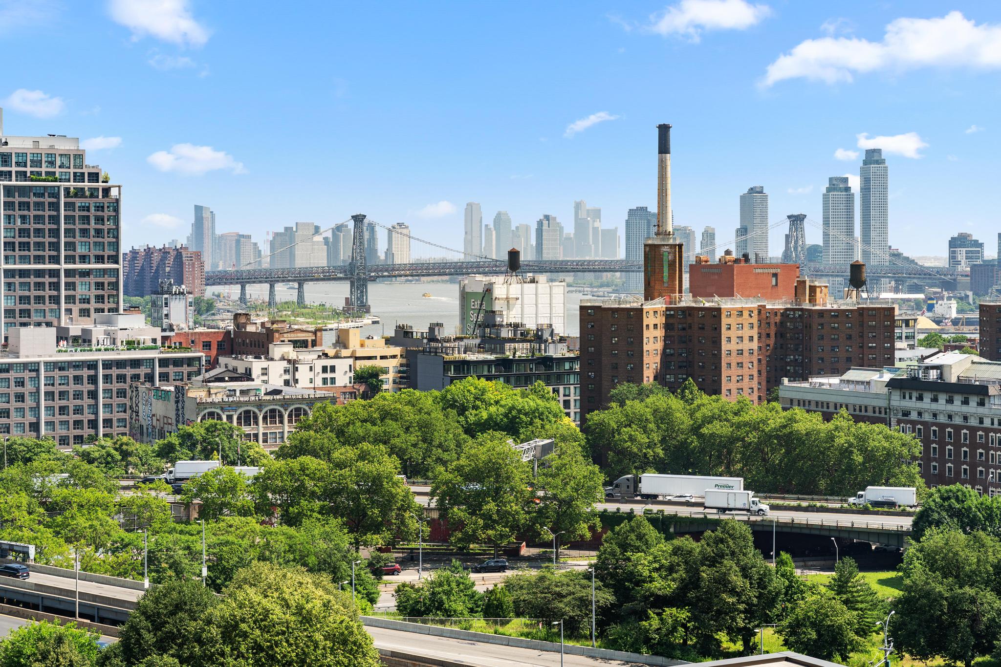 230 Jay Street, Unit 10H Brooklyn, NY 11201 - Photo 9 of 13 a view of a city with tall buildings