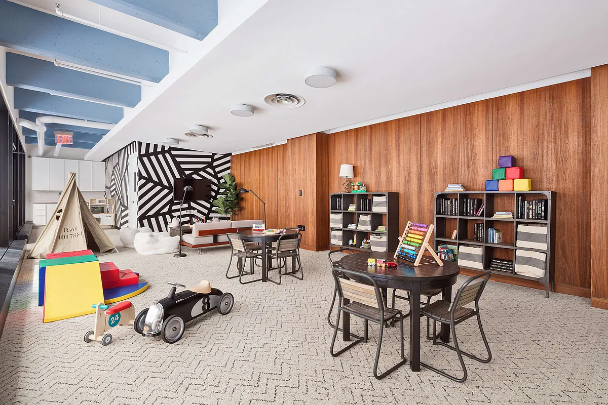 184 Kent Avenue, Unit D519 Brooklyn, NY 11249 - Photo 15 of 17 a play room with furniture