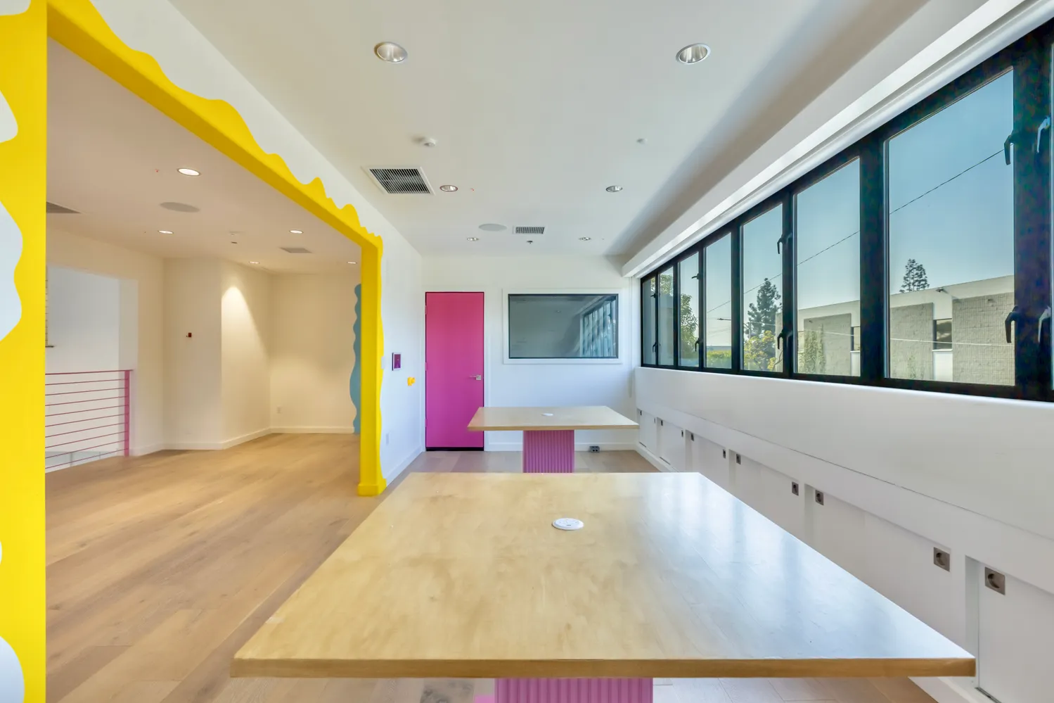 a view of a room with a flat screen tv