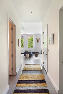 a view of a patio with a table and chairs