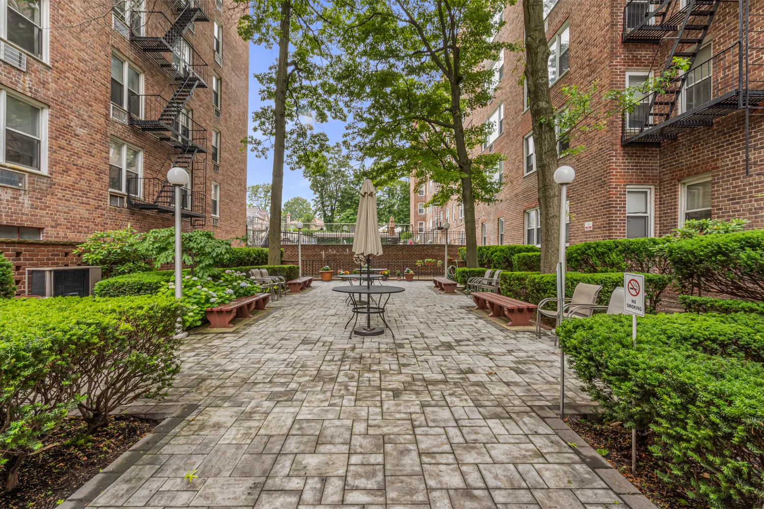 a view of a swimming pool with a patio