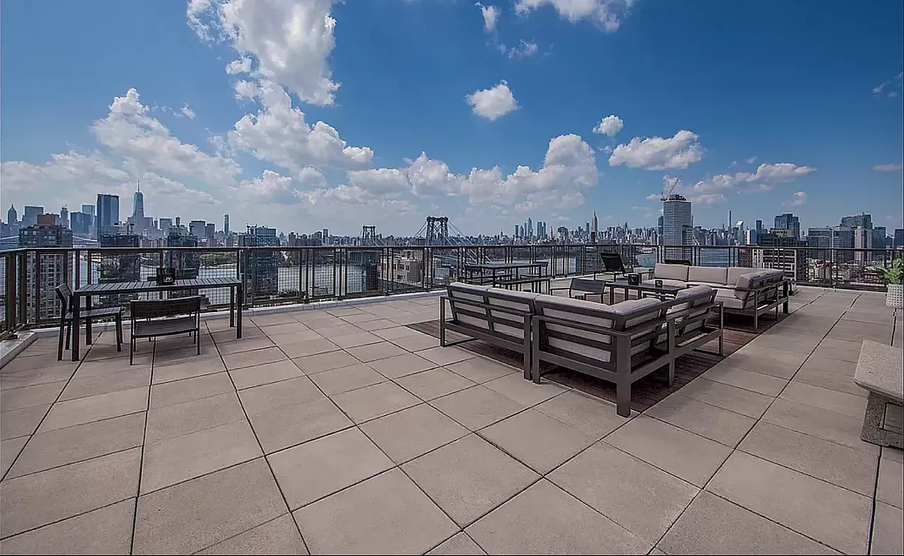 424 Bedford Avenue, Unit 19B Brooklyn, NY 11249 - Photo 9 of 11 a outdoor space with lots of tables and chairs