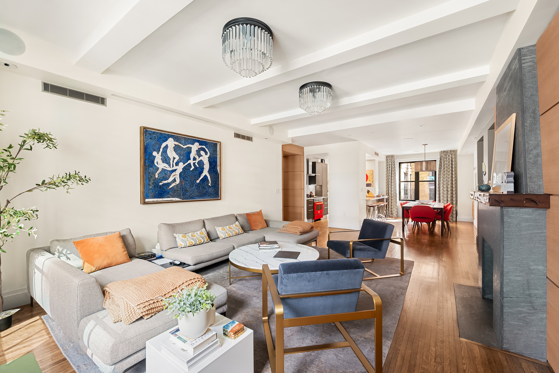 77 Park Avenue, Unit 11E Manhattan, NY 10016 - Photo 3 of 10 a living room with furniture and wooden floor