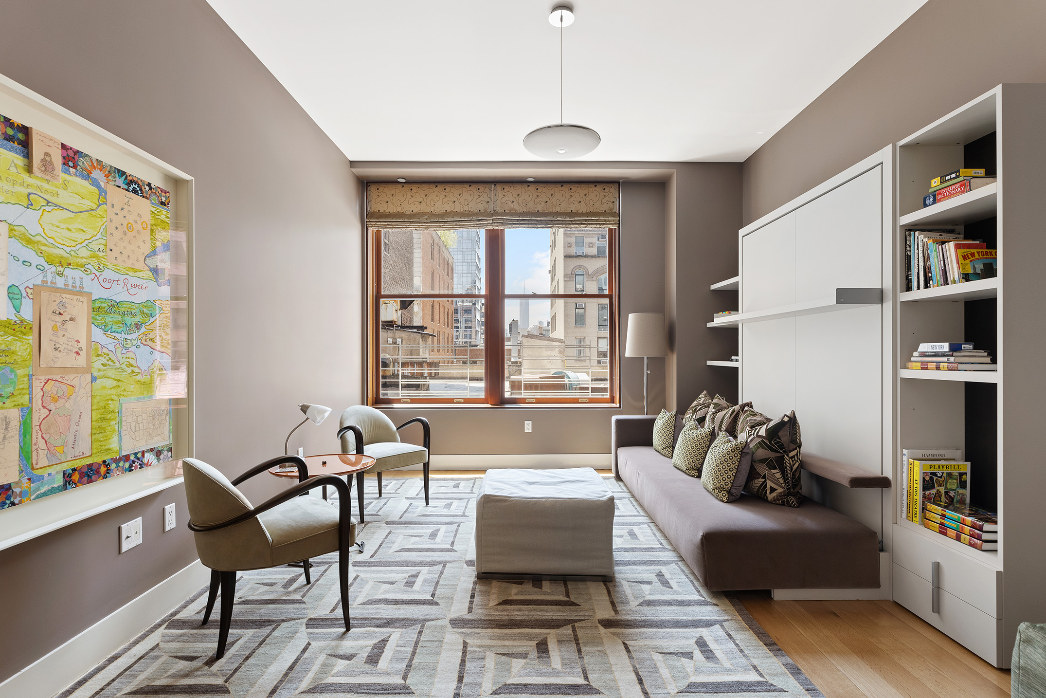 32 West 18th Street, Unit 7B Manhattan, NY 10011 - Photo 9 of 19 a living room with furniture a flat screen tv and a floor to ceiling window
