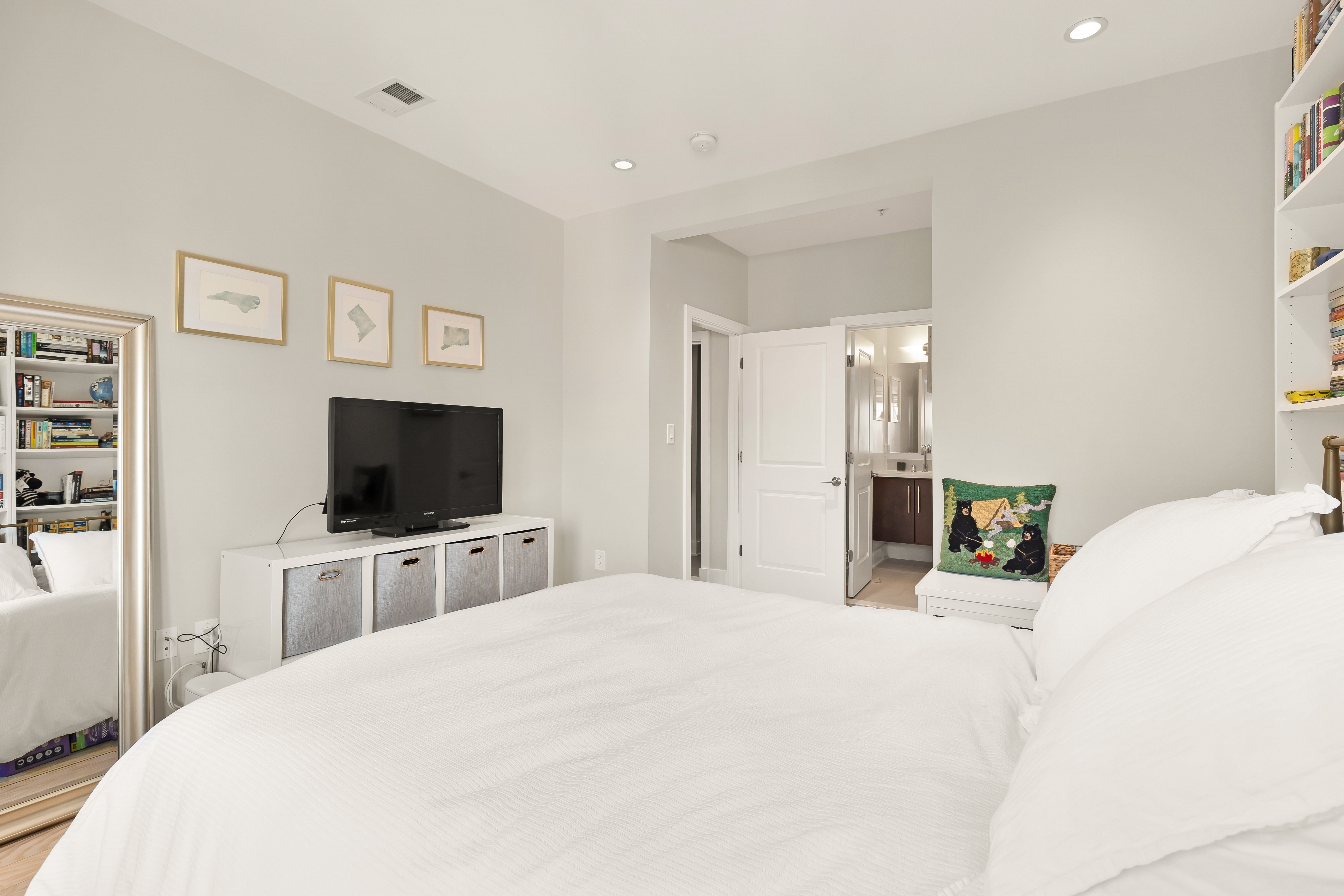 2101 11th Street Northwest, Unit 403 Washington, DC 20001 - Photo 20 of 30 a bedroom with a bed and a flat screen tv