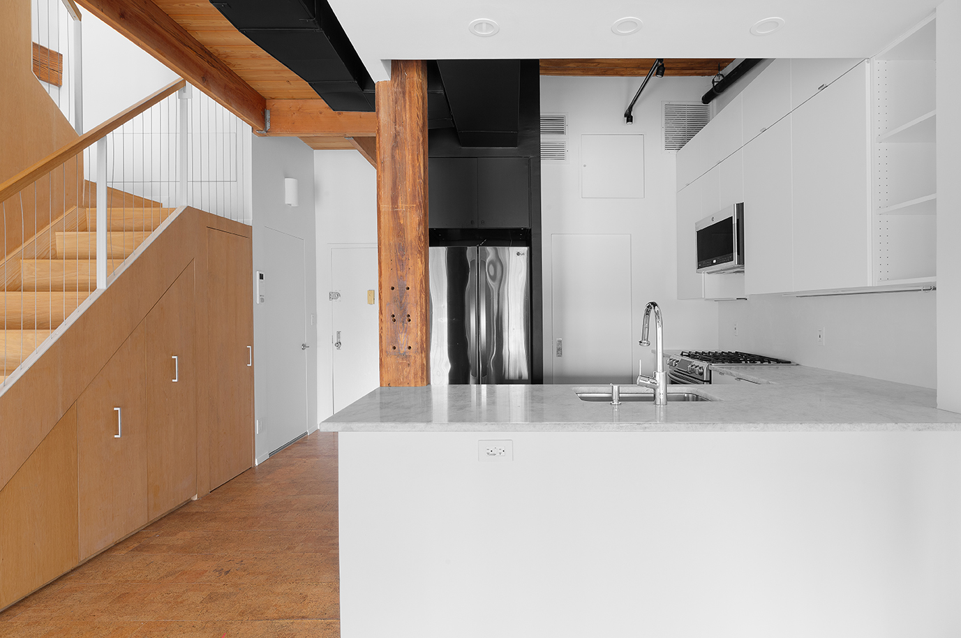 376 President Street, Unit 4D Brooklyn, NY 11231 - Photo 5 of 18 a kitchen with a sink and a refrigerator