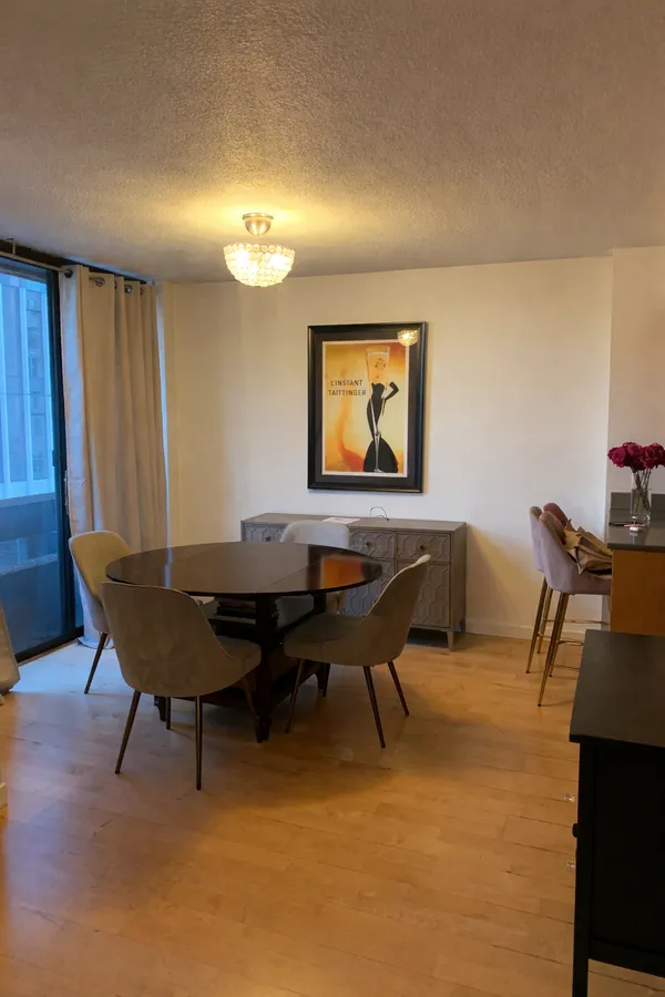 a view of a workspace with furniture