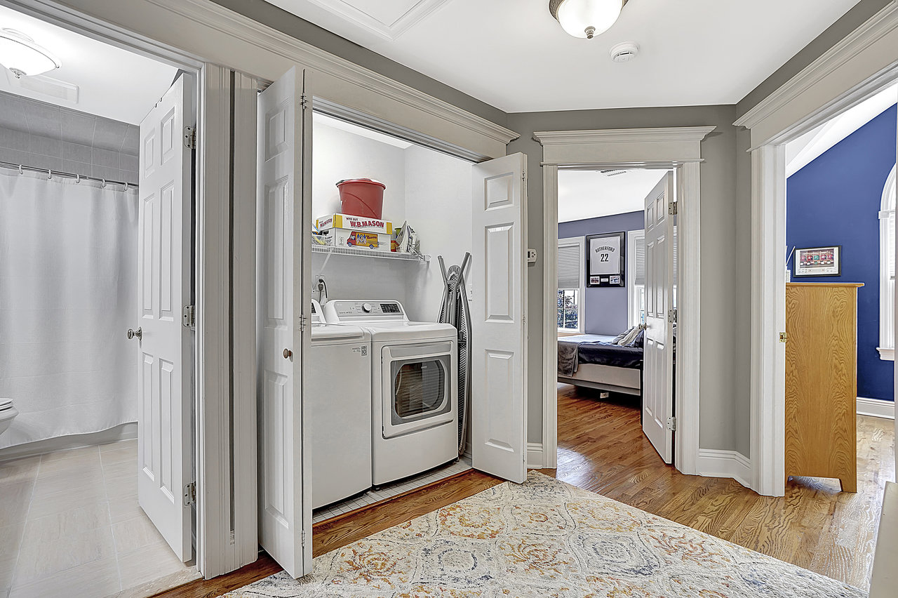 266 Feronia Way Rutherford, NJ 07070 - Photo 17 of 41 a view of a hallway with washer and dryer