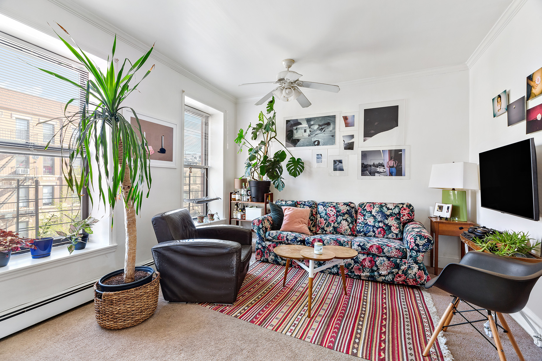 232 Monroe Street Brooklyn, NY 11216 - Photo 14 of 21 a living room with furniture fireplace and flat screen tv