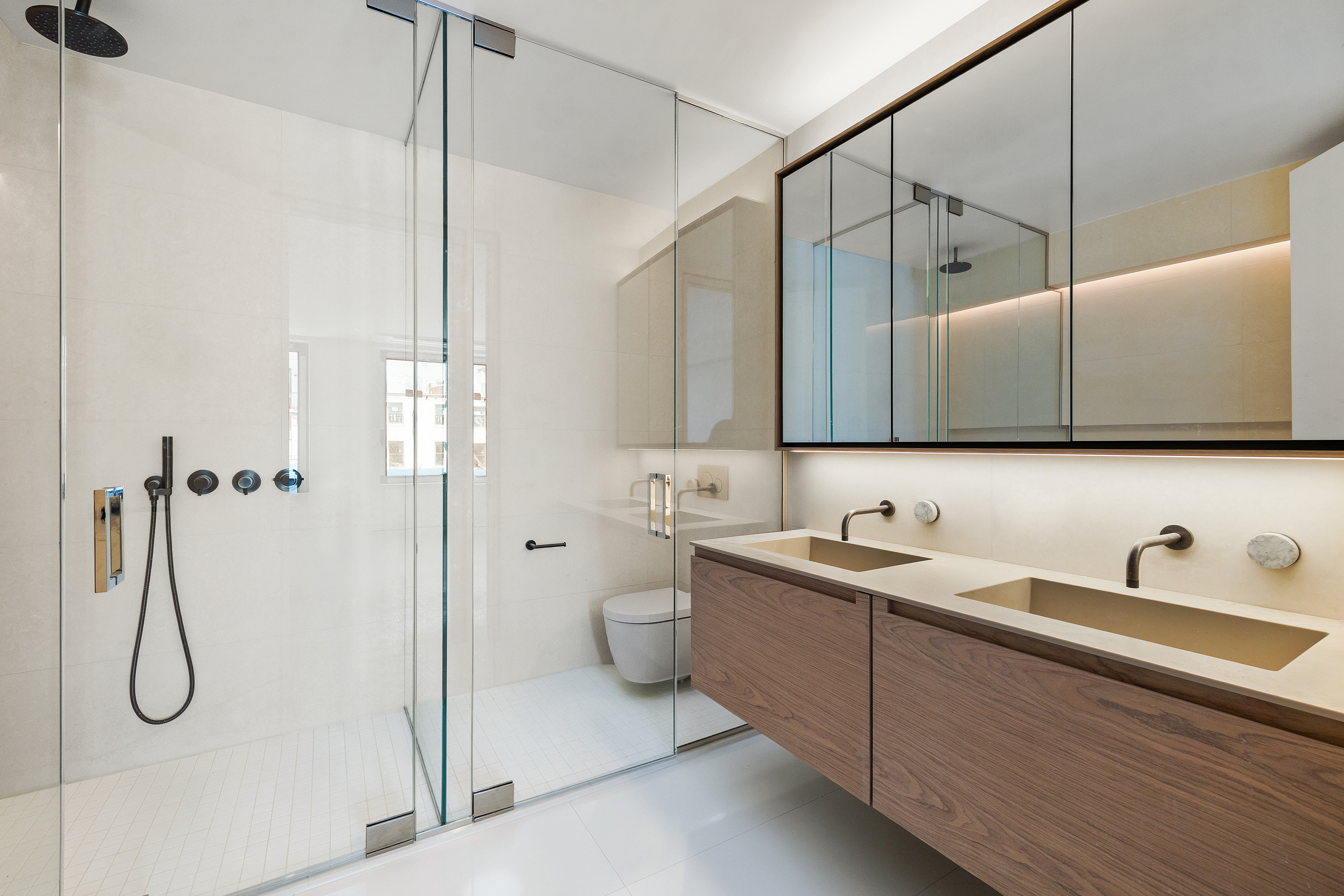 55 Douglass Street, Unit TWNHS Brooklyn, NY 11231 - Photo 6 of 10 a bathroom with a double vanity sink a toilet and shower