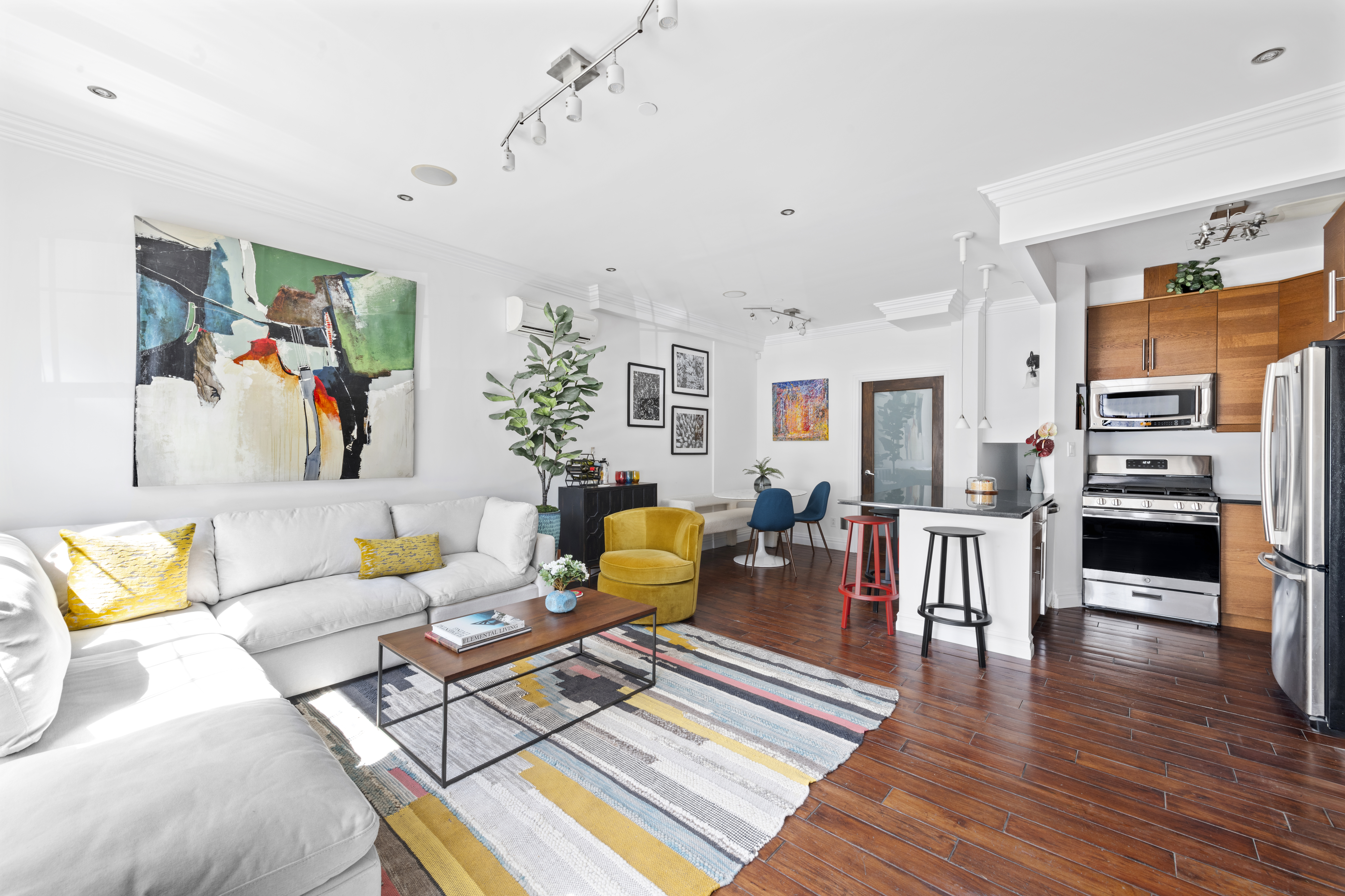 37 Powers Street, Unit 1A Brooklyn, NY 11211 - Photo 2 of 9 a living room with furniture fireplace and wooden floor