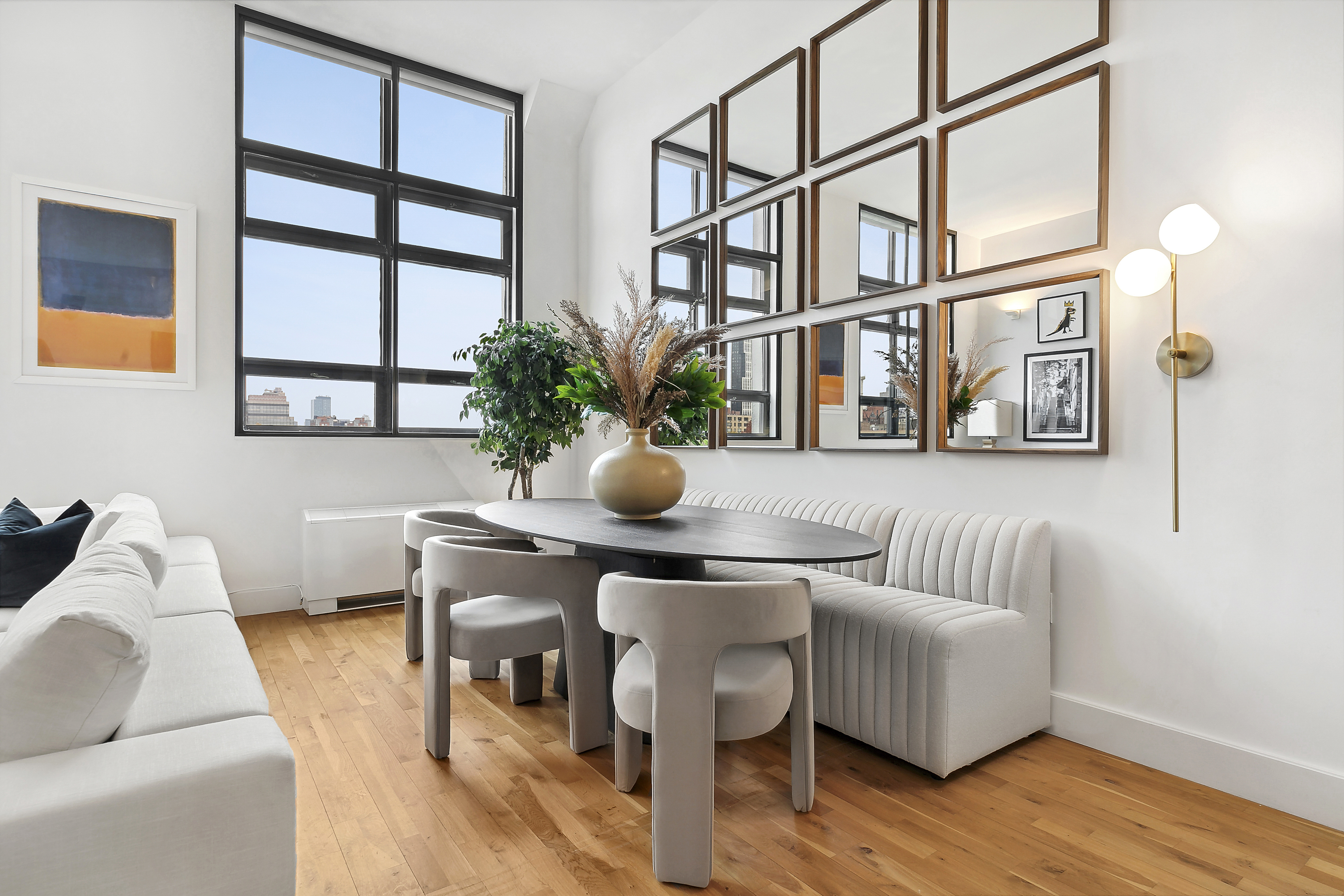 360 Furman Street, Unit 812 Brooklyn, NY 11201 - Photo 5 of 39 a living room with furniture and wooden floor