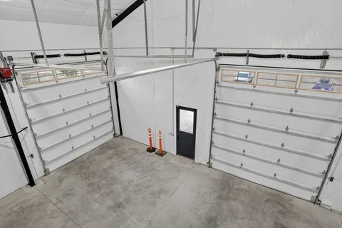 a view of a closet with storage