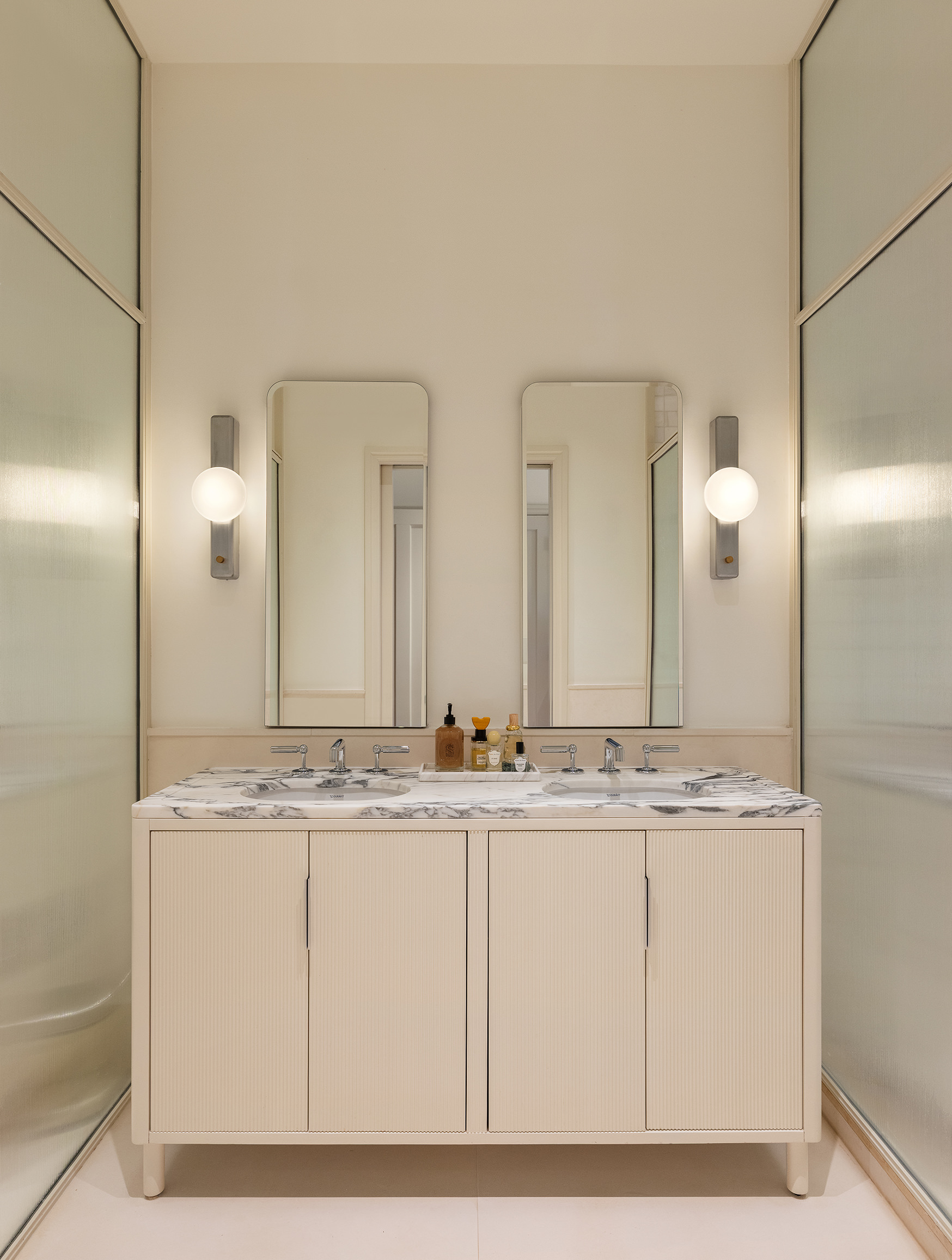 1 Prospect Park West, Unit 2B Brooklyn, NY 11215 - Photo 11 of 23 a bathroom with a sink and a mirror
