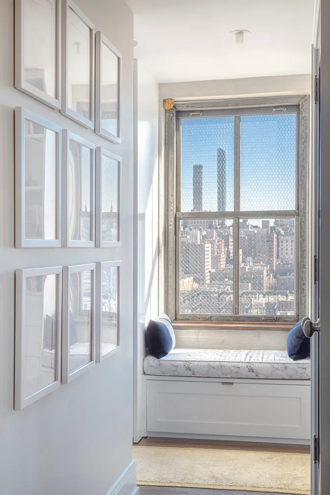 a view of wooden floor and a living room